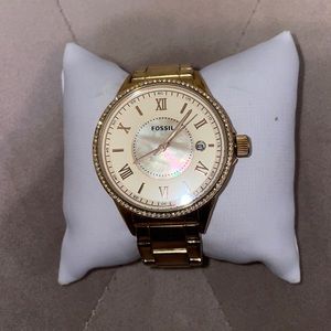 Women’s gold toned Fossil watch